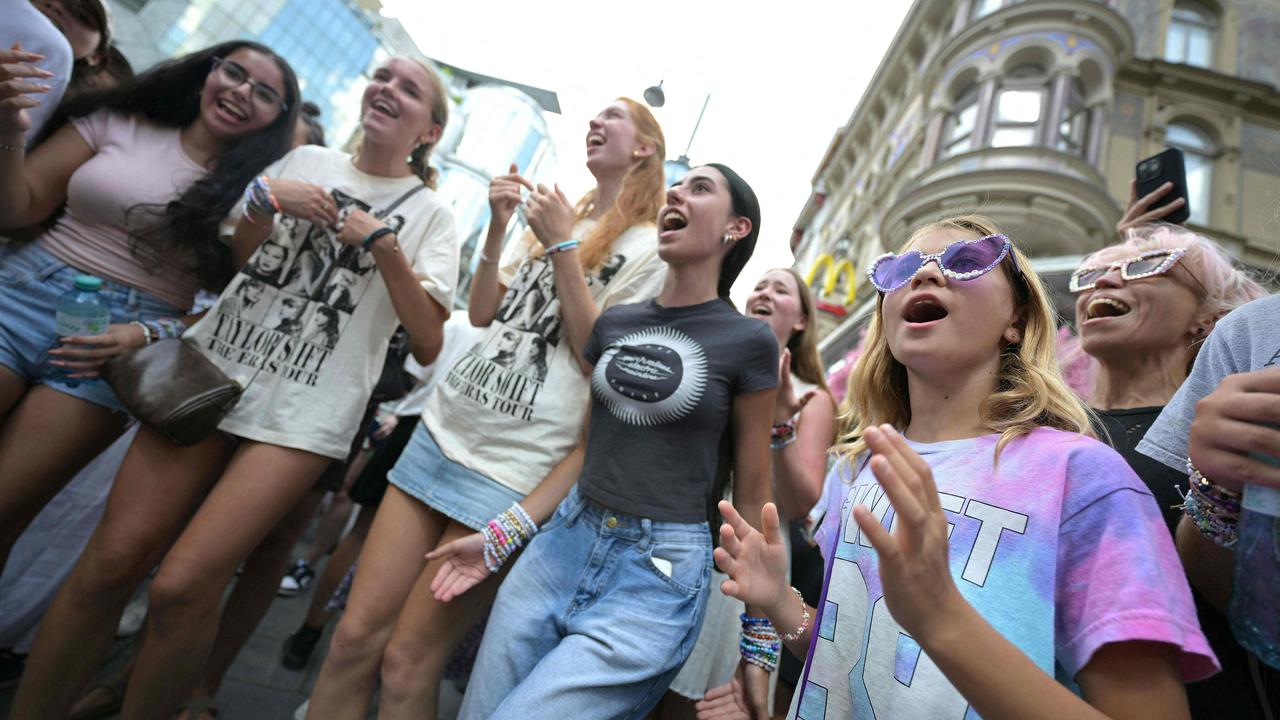 Swifties gathered in the city centre in Vienna, Austria, after her three scheduled concerts were cancelled following the arrest of an Islamic State sympathiser. Picture: ROLAND SCHLAGER / AFP.