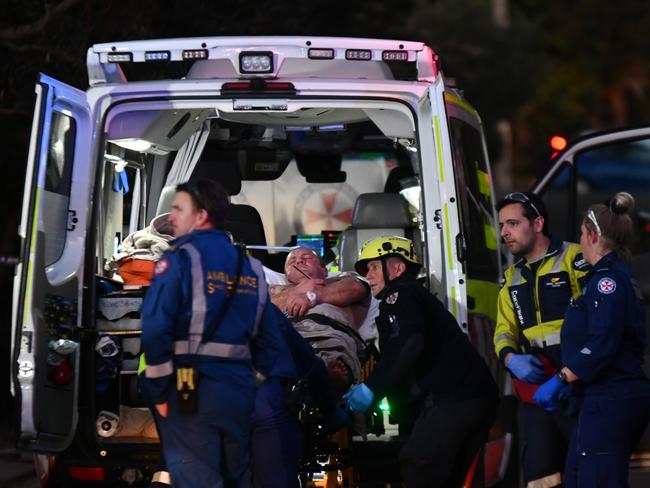 The injured man, 48, with a spear protruding from his chest, which landed just centimetres from his heart. Picture: Sebastien Dekker