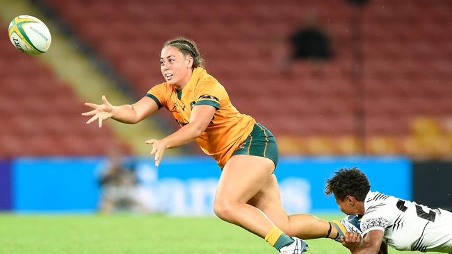 Madison Schuck of the Wallaroos passes the ball during the Women's International Test match between the Australia Wallaroos and Fijiana at Suncorp Stadium on May 06, 2022 in Brisbane, Australia. (Photo by Matt Roberts/Getty Images)