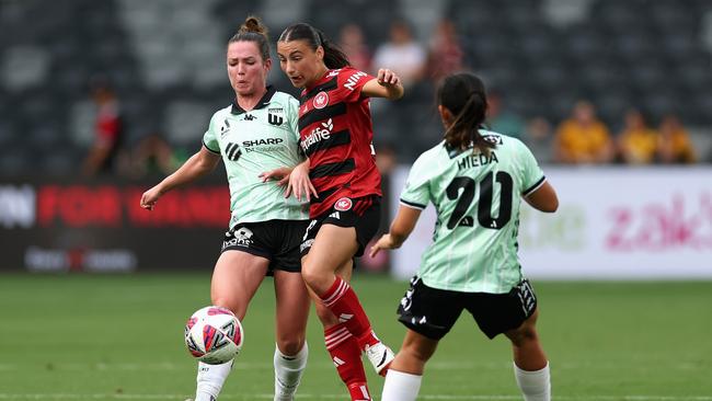 SYDNEY, AUSTRALIA - DECEMBER 14: Sienna Saveska of the Wanderers is tackled during the round six A-League Women's match between Western Sydney Wanderers and Western United at CommBank Stadium, on December 14, 2024, in Sydney, Australia. (Photo by Cameron Spencer/Getty Images)