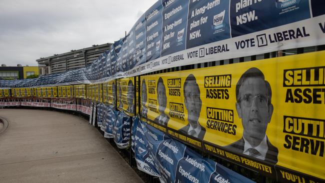 Election posters outside The Ponds High School, where dozens of demountable classrooms service an exploding school population. Picture: Nathan Schmidt