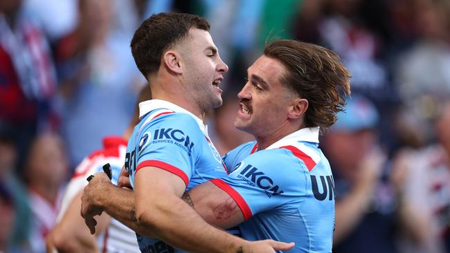 SYDNEY, AUSTRALIA - APRIL 25: SandonÃÂ Smith of the Roosters celebrates with ConnorÃÂ Watson of the Roosters after scoring a try during the round eight NRL match between the Sydney Roosters and St George Illawarra Dragons at Allianz Stadium on April 25, 2025, in Sydney, Australia. (Photo by Cameron Spencer/Getty Images)