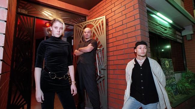 Cargo Club door staff Emma Herriman and George Elovaris with Garth Findlay in 1996. Picture: Michael Marschall