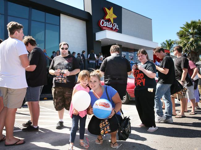 Maxine Midson of Long Jetty with daughter Kayleigh Baxter, 5, in the queue on the first day of business for the first Carl's Jnr in Australia. Picture: Troy Snook                        <a class="capi-image" capiId="6cb3d390b9d1a31d2e20b4baa152bd7e"></a>