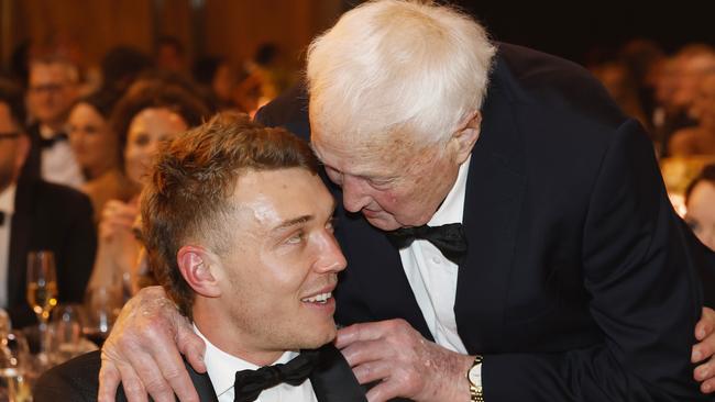 NCA. MELBOURNE, AUSTRALIA. September 23 , 2024.  The 2024 AFL Brownlow medal at the Palladium room in Crown Casino, Melbourne.   Patrick Cripps of the Blues is congratulated by Carlton legend John Nicholls  after winning the 2024 Brownlow Medal .       .  Pic:Michael Klein