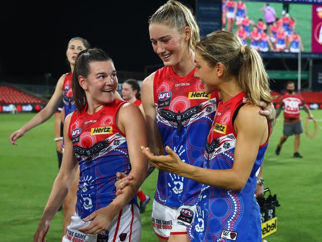 Harris and the Dees celebrate after the game. Picture: Getty Images