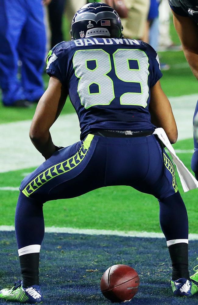 Super Bowl XLIX: Seattle's Doug Baldwin fined for obscene gesture after  'poop' touchdown celebration