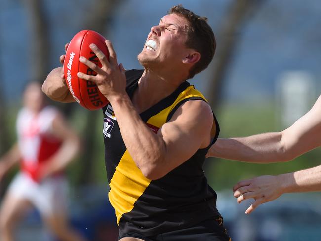 Robert Allen takes a mark for Woori Yallock' in the preliminary final. Picture: Josie Hayden