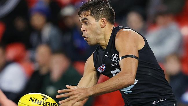 AFL Round 6.  Carlton vs Western Bulldogs at Metricon Stadium, Gold Coast. 12/07/2020.   Jack Martin of the Blues gives Marcus Bontempelli of the Bulldogs the slip  . Pic: Michael Klein