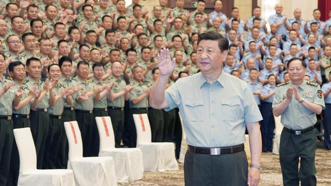 Chinese President Xi Jinping meets with military officers and troops stationed in northwest China's Xinjiang Uygur Autonomous Region. Picture: Getty