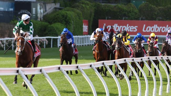 James McDonald looks at the big screen as Via Sistina destroys her rivals in the Cox Plate. Picture: Robert Cianflone/Getty Images