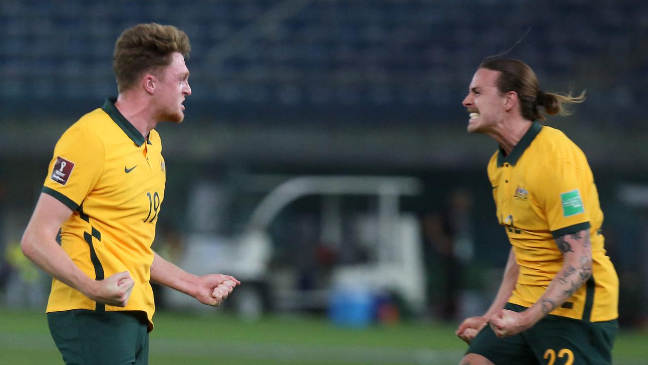 Australia's Harry Souttar (L) scored the only goal as the Socceroos completed a record eight-straight win in World Cup Qualifying.