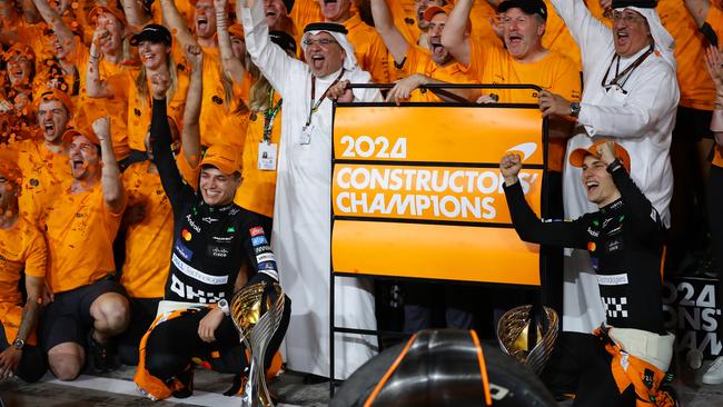 Lando Norris, Piastri and the McLaren team celebrate winning the 2024 F1 Constructors’ title. (Photo by Joe Portlock/Getty Images)