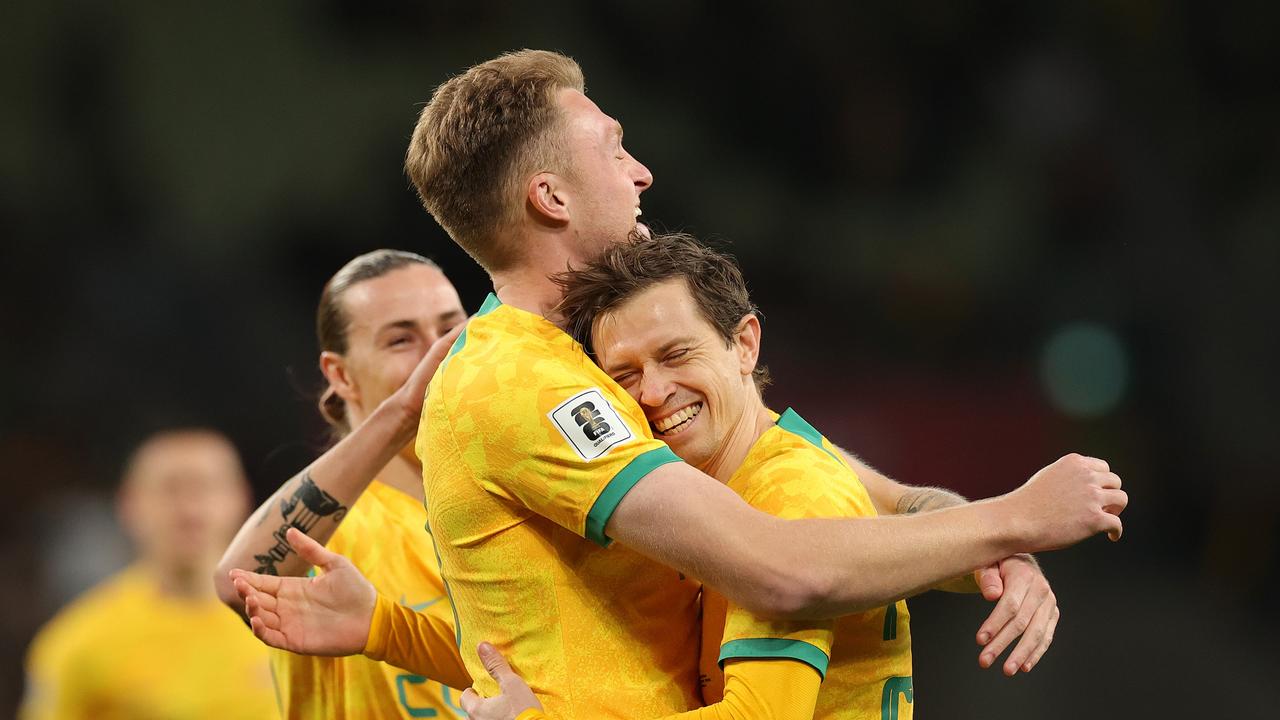 Australia got plenty of hug practice. Photo by Kelly Defina/Getty Images