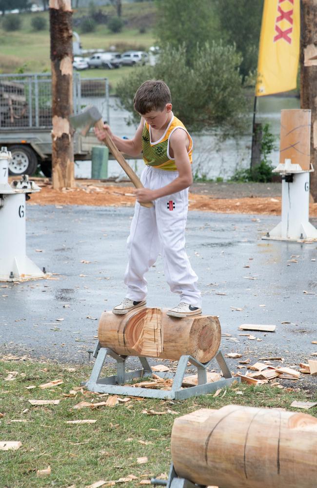 Young axeman, Darcy Head, competes in a heat of the woodchop.Heritage Bank Toowoomba Royal Show.Saturday April 20th, 2024 Picture: Bev Lacey