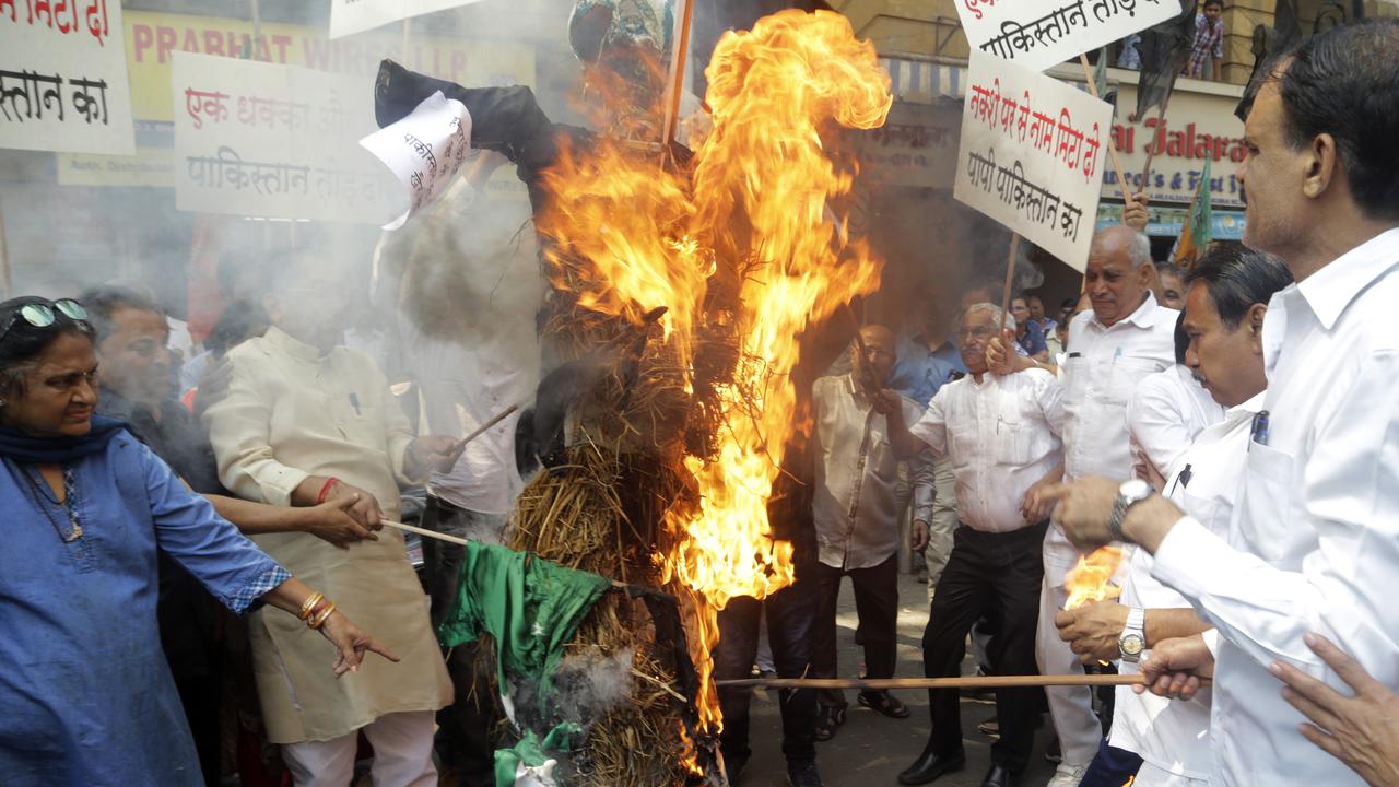 Workers from India’s ruling Bharatiya Janata Party burn a symbolic effigy of Pakistan as part of protest against Thursday’s attack. Picture: Rajanish Kakade/AP