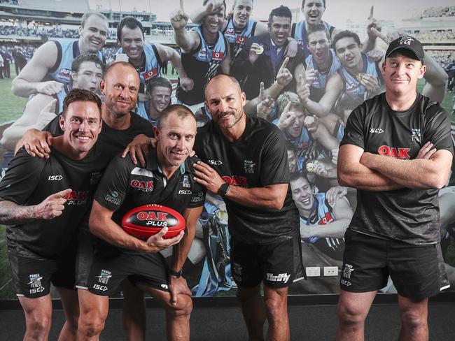 Port Adelaide’s coaching panel members and 2004 Grand Finalists Jarrad Schofield, Chad Cornes, Michael Wilson and Brett Montgomery with Michael Voss. Picture: Sarah Reed