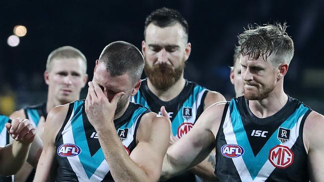 AFL - Friday, 16th October, 2020 - Preliminary Final - Port Adelaide v Richmond at the Adelaide Oval. Brad Ebert with tears in his eyes is consoled by Tom Jonas as they walk off after the loss Picture: Sarah Reed