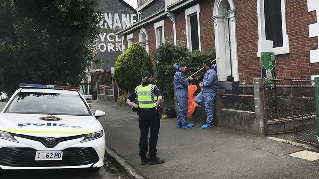 Tasmania Police at the scene of Ms Zhang’s death in Wellington Street, Launceston. Picture: Helen Kempton