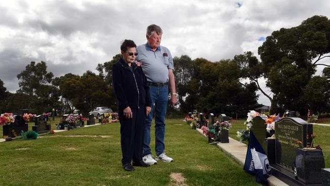 Des and Maureen Giles have had Geelong Cats memorabilia stolen from their son Paul's grave twice following the premiership win. Picture: David Smith