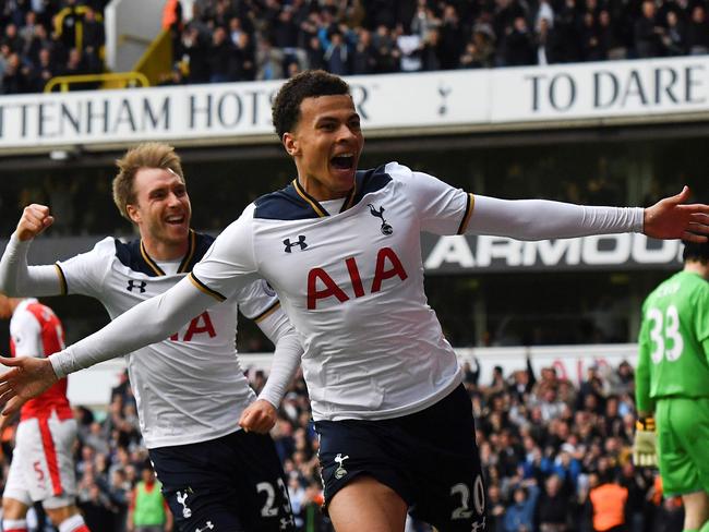 Tottenham Hotspur's English midfielder Dele Alli (R) celebrates scoring the opening goal with Tottenham Hotspur's Danish midfielder Christian Eriksen during the English Premier League football match between Tottenham Hotspur and Arsenal at White Hart Lane in London, on April 30, 2017.  / AFP PHOTO / Ben STANSALL / RESTRICTED TO EDITORIAL USE. No use with unauthorized audio, video, data, fixture lists, club/league logos or 'live' services. Online in-match use limited to 75 images, no video emulation. No use in betting, games or single club/league/player publications.  /