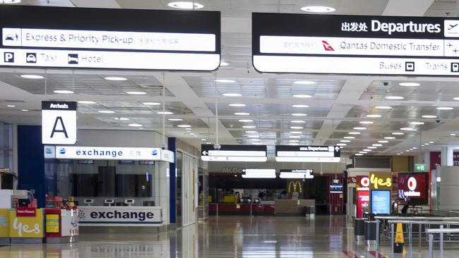 Since caps on international arrivals were brought in, some of the country’s busiest airports have sat near dormant. Pictured is Sydney Airport. Picture by Damian Shaw