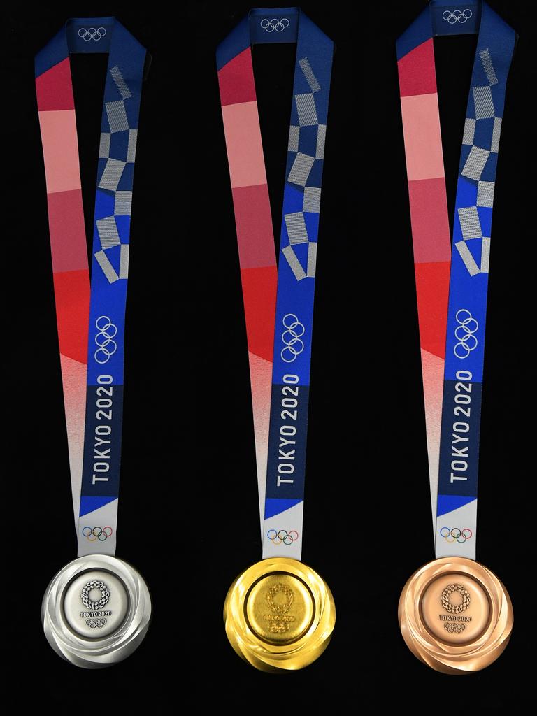 The silver, gold and bronze medals of the Tokyo Games are the first Olympic medals to be made entirely from recycled metals. Picture: Getty Images