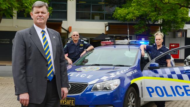 Police Association of SA (PASA) president Mark Carroll with Senior Constables Paul Jelfs and Tash Smith, who were assaulted in the line of duty. Picture: AAP / Brenton Edwards