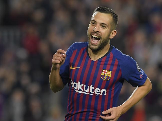 Barcelona's Spanish defender Jordi Alba celebrates after scoring during the UEFA Champions League group B match Barcelona against Inter Milan at the Camp Nou stadium in Barcelona on October 24, 2018. (Photo by LLUIS GENE / AFP)
