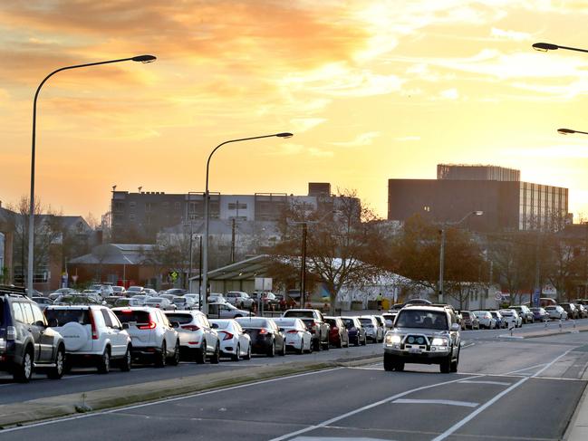 A long line up of cars waits for testing at Hart’s Mill, Port Adelaide at about 7.20am on Wednesday, July 21. Picture Dean Martin