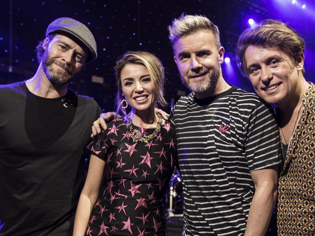 Take That and Dannii Minogue play Perth Arena: Danii Minogue is pictured with Take That members Howard Donald, Gary Barlow & Mark Owen. Photo by Michael Wilson, The West Australian.