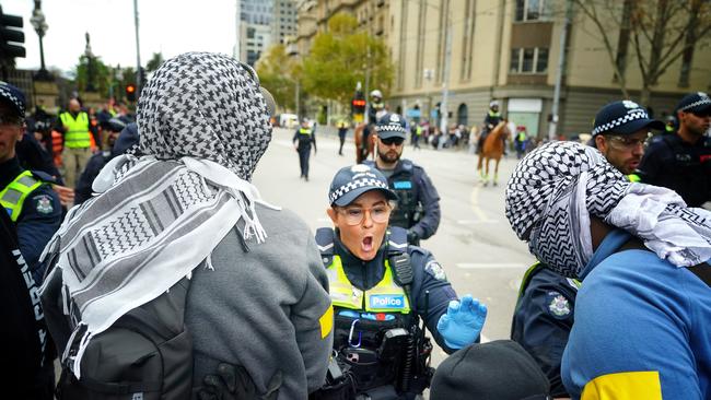 Many of the pro-Palestine protesters used keffiyeh scarves to cover their faces. Picture: NCA NewsWire / Luis Enrique Ascui