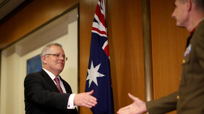 PM Scott Morrison meets the Chief of the Defence Force, General Angus Campbell, at Parliament House. Picture Jonathan Ng