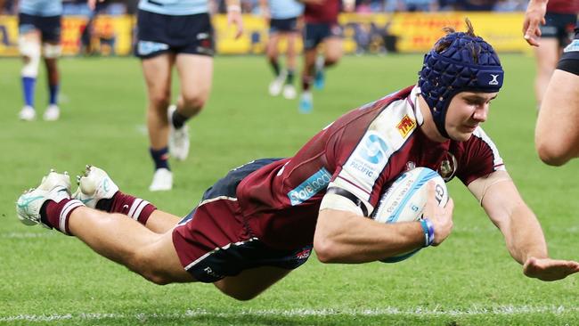 SYDNEY, AUSTRALIA - MAY 31:  Josh Flook of the Reds scores a try during the round 15 Super Rugby Pacific match between NSW Waratahs and Queensland Reds at Allianz Stadium, on May 31, 2024, in Sydney, Australia. (Photo by Matt King/Getty Images)