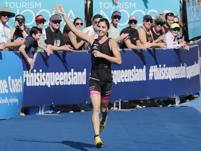 Ashleigh Gentle wins the elite women’s event at the 2016 Noosa Triathlon. Picture: Lachie Millard