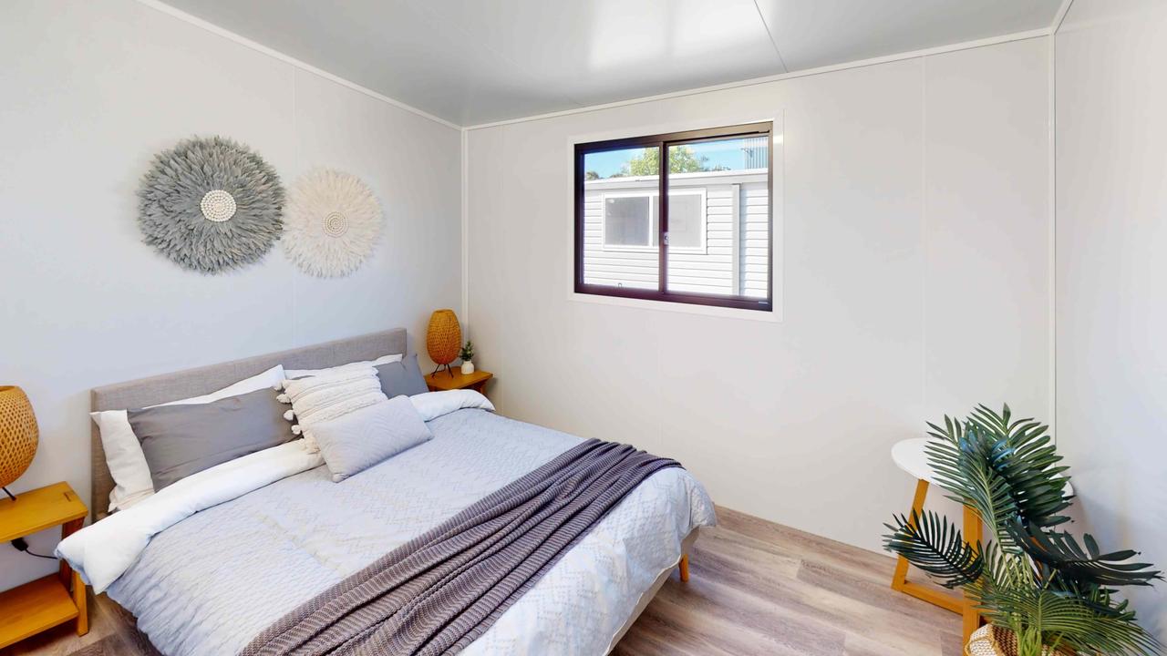 A bedroom inside a VanHome.