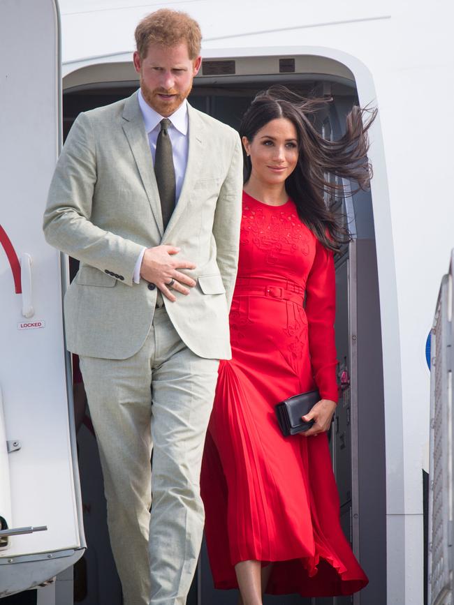 Prince Harry and Meghan pictured on arrival at Fua'amotu Airport in Tonga. Picture: Getty