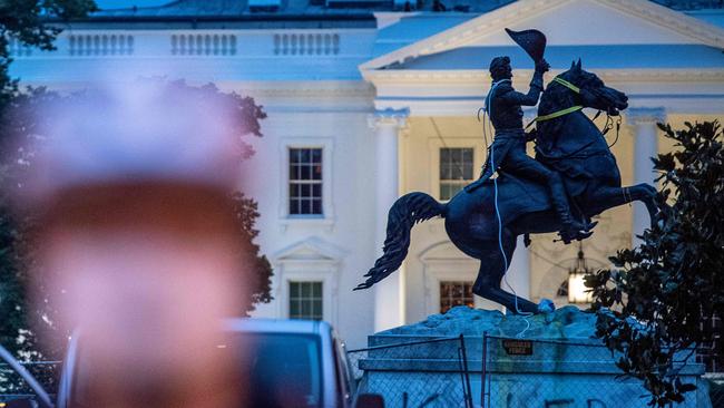 Protesters get a rope around the statue of Andrew Jackson outside the White House. Picture: AFP