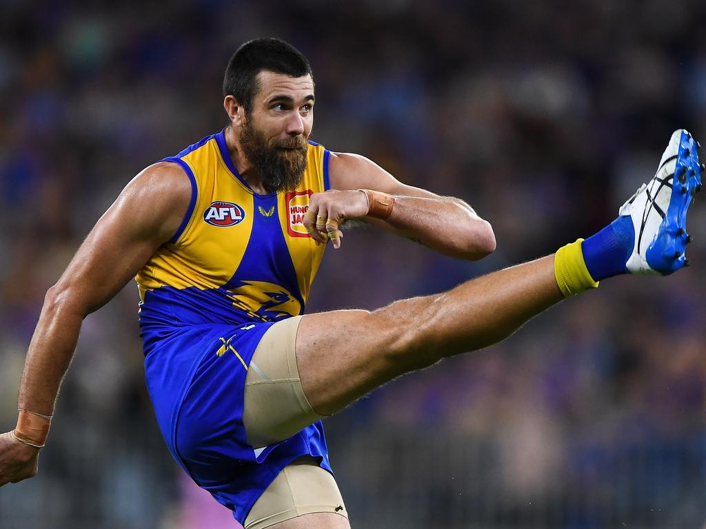 Adelaide, Australia. 03rd June, 2023. Conor Nash of the Hawks is tackled by  Dan Houston and Riley Bonner of the Power during the AFL Round 12 match  between the Port Adelaide Power