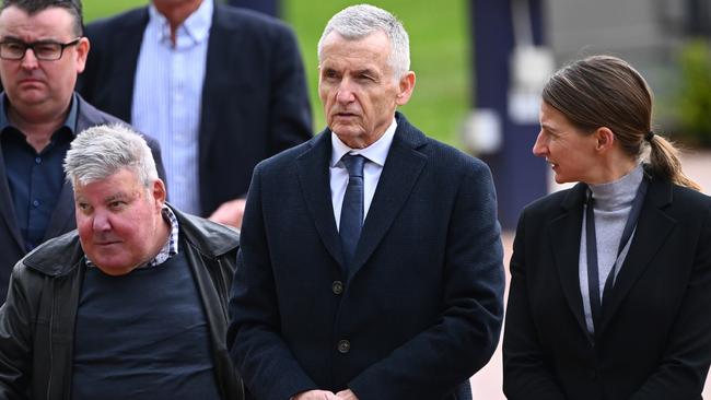 Bruce McAvaney arrives for the funeral.