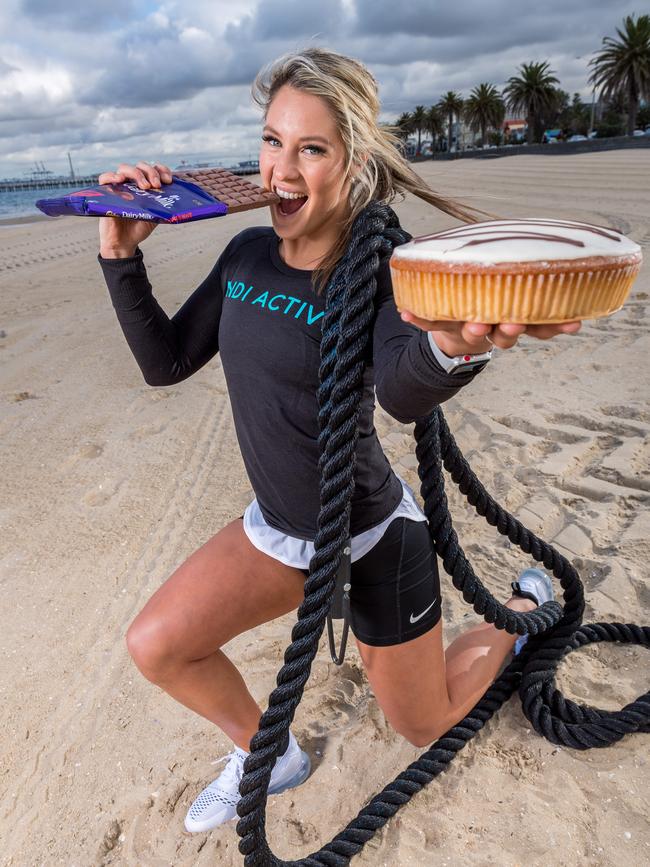 Exercise is sweet. Personal trainer Brie Riechman enjoys chocolate while exercising. Picture: Jake Nowakowski