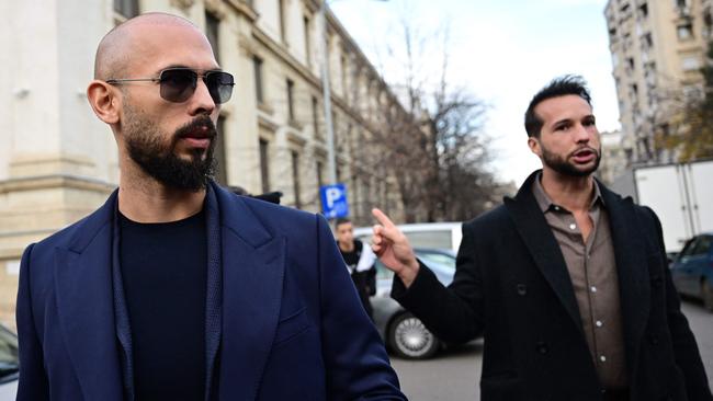 Andrew Tate (L) and his brother Tristan Tate (R) walk from the Bucharest's Court of Appeal. Picture: Daniel Mihailescu/AFP