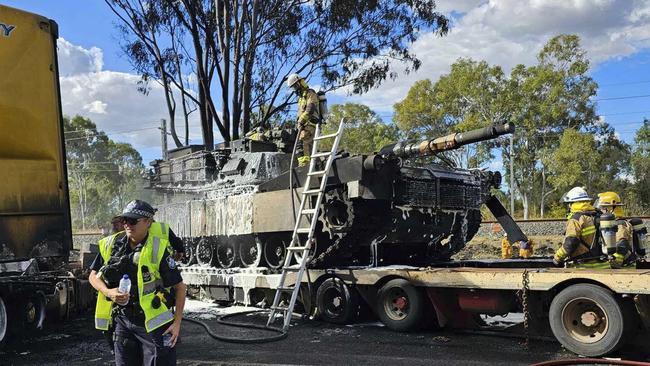 A burnt-out Army tank at the Bajool crash, estimated to cost between $8 million to $10 million.