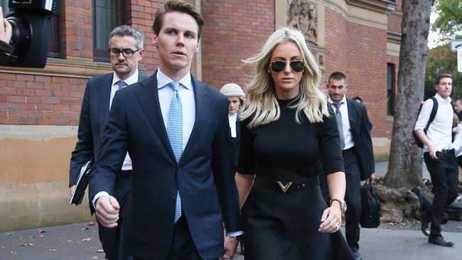 Oliver Curtis and Roxy Jacenko depart Sydney’s Supreme Court yesterday after the first day of Curtis’s trial. Picture: Dylan Robinson