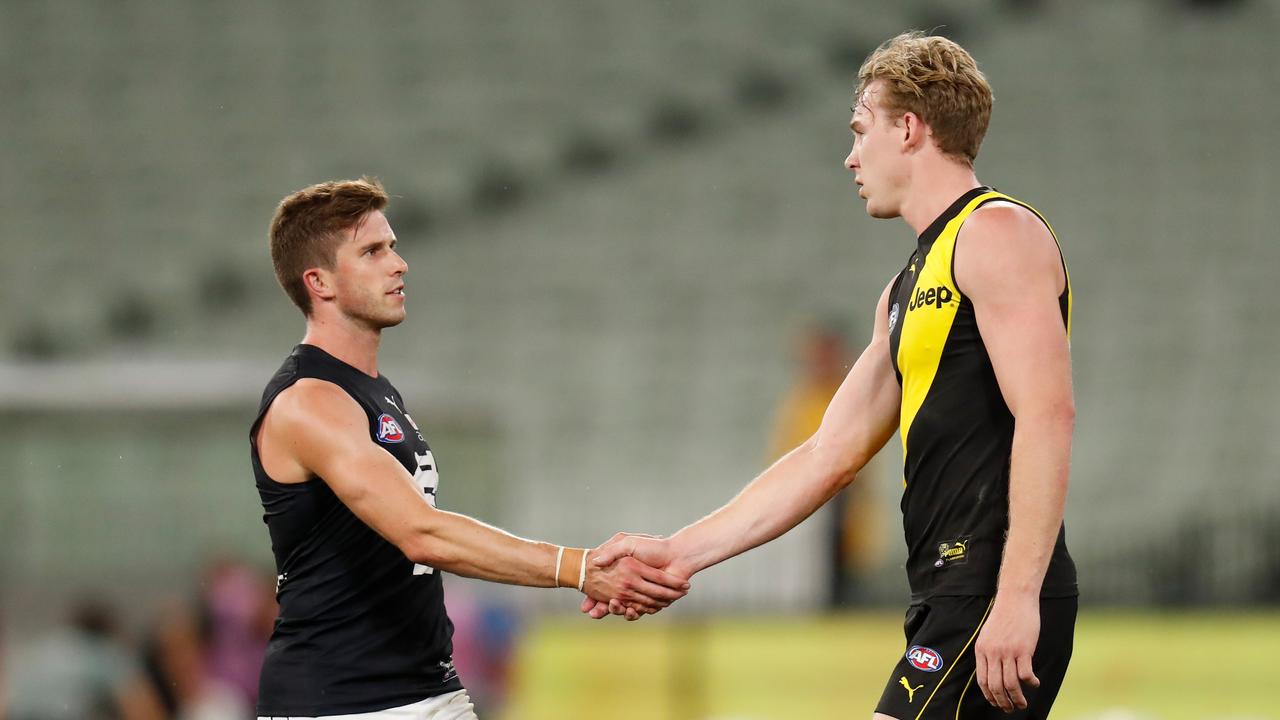 Marc Murphy of the Blues and Tom Lynch of the Tigers shake hands post-game. Picture: Michael Willson