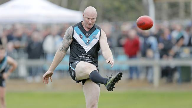 Former AFL star Barry Hall kicks a goal for Cygnet against Lindisfarne in the SFL. Picture: PATRICK GEE