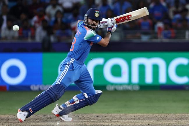 Virat Kohli steered India to the Champions Trophy final with a fine 84 against Australia in Tuesday's semi-final in Dubai