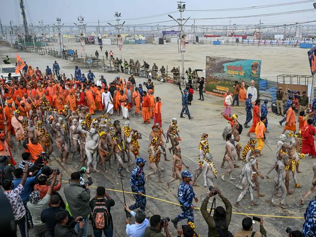 Naga Sadhus, or Hindu holy men, arrive in a procession to take a dip in Sangam, the confluence of Ganges, Yamuna and mythical Saraswati rivers. Picture: AFP