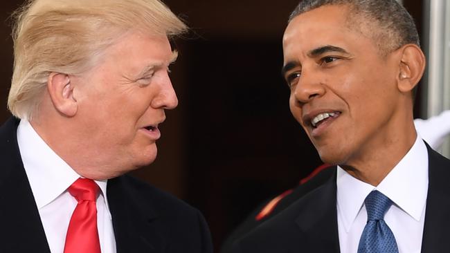 Donald Trump and his arch-enemy Barack Obama together on inauguration day in 2017. Picture: Jim Watson/AFP