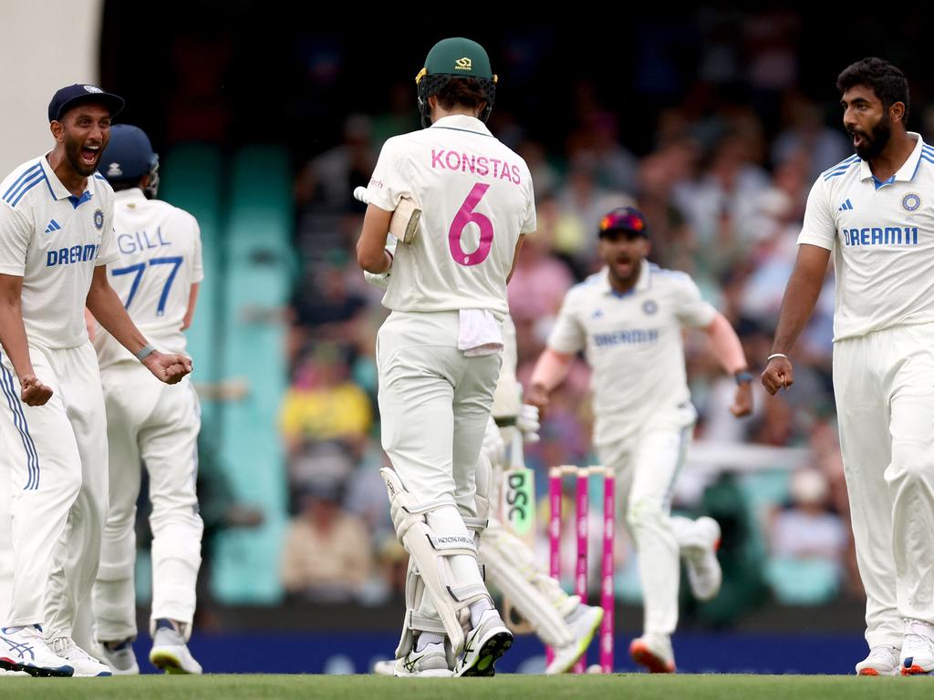 India’s stars converge on youngster Sam Konstas after the first-innings dismissal of Usman Khawaja. Picture: AFP